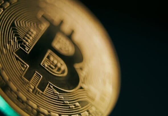 Close,Up,Of,Gold,Bitcoin,Coin,Spinning,On,The,Dark
