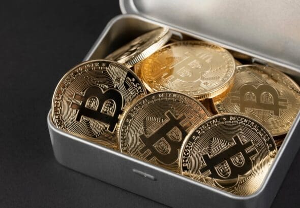 Tin,Case,Filled,With,Bitcoin,,Cryptocurrency,Concept