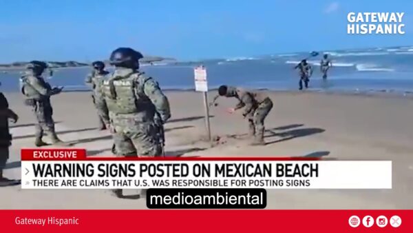 Warning signs installed on Mexican beach declaring area restricted by U.S.